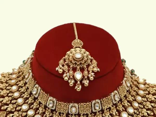 Heavy bridal brass choker necklace set with earrings and maang tikka in antique gold finish, Ishwar Arts and Crafts