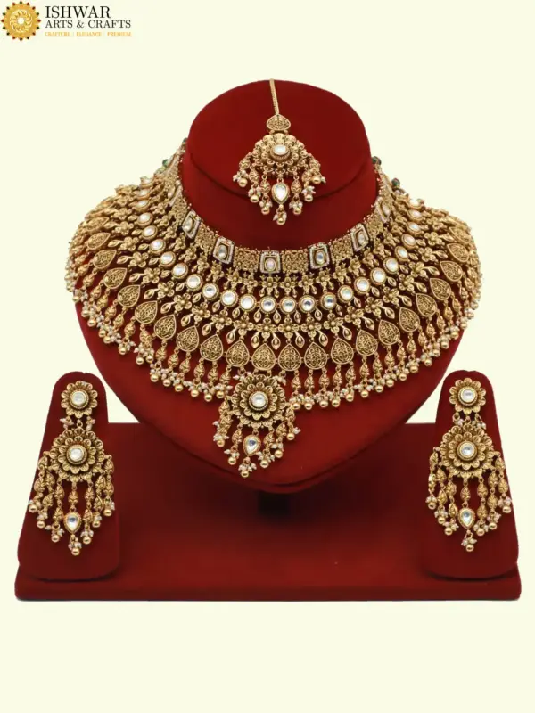 Heavy bridal brass choker necklace set with earrings and maang tikka in antique gold finish, Ishwar Arts and Crafts